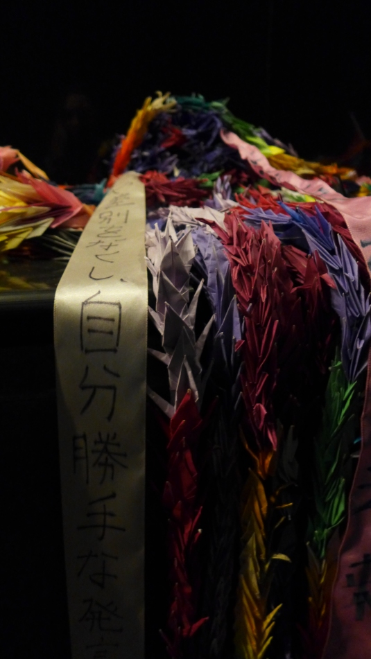 Paper cranes and wishes written in Japanese in memorial (Photo: emccall 11/13)